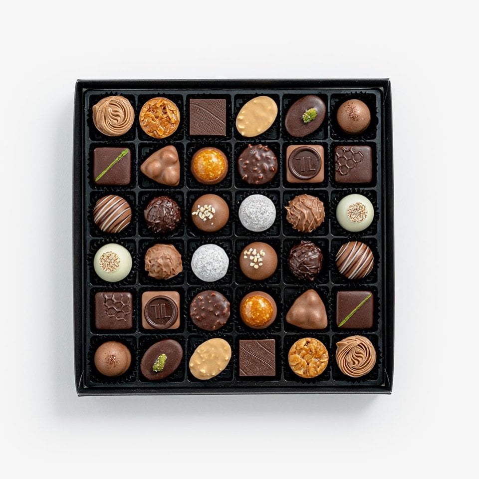 レベル イエール スモールバッチ リザーブ：750m Shop Pralines & Truffles with alcohol 36 pcs per box by Läderach